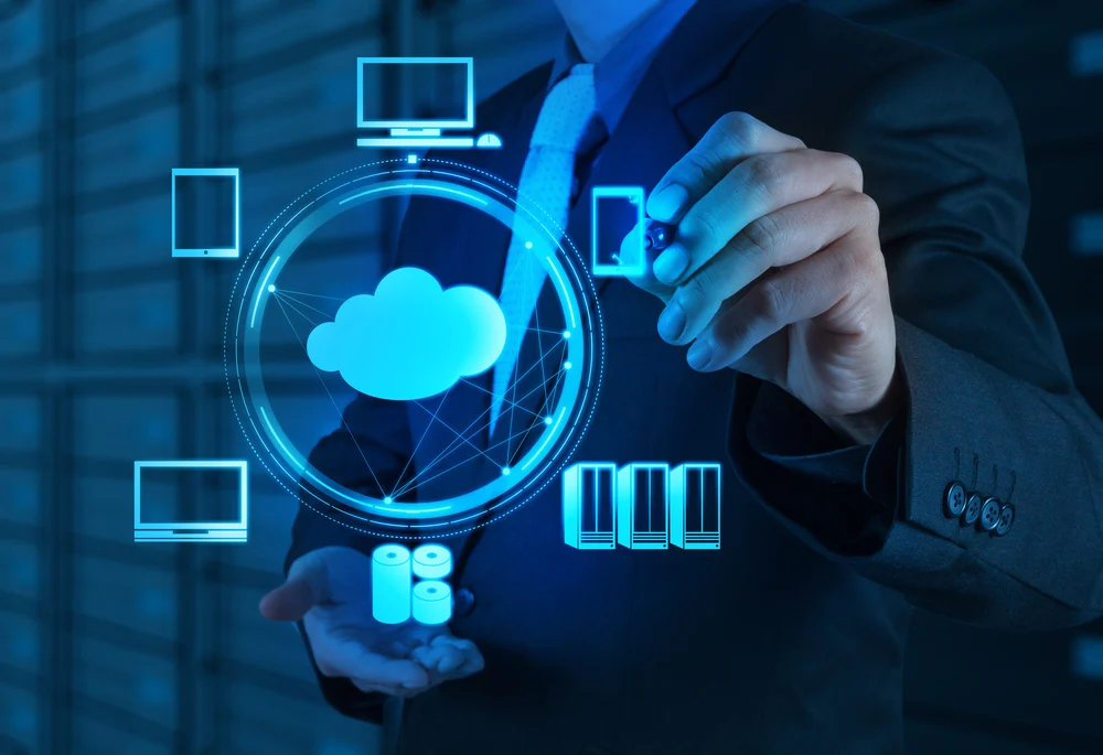 Businessman working with a cloud computing diagram on the new computer interface